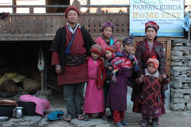 The Lama family, in front of their Gatlang home