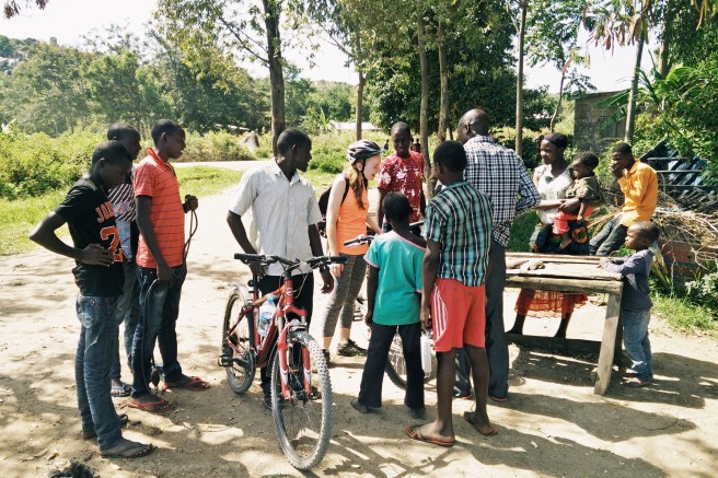 Inspecting the fish alongside a gaggle of new friends.